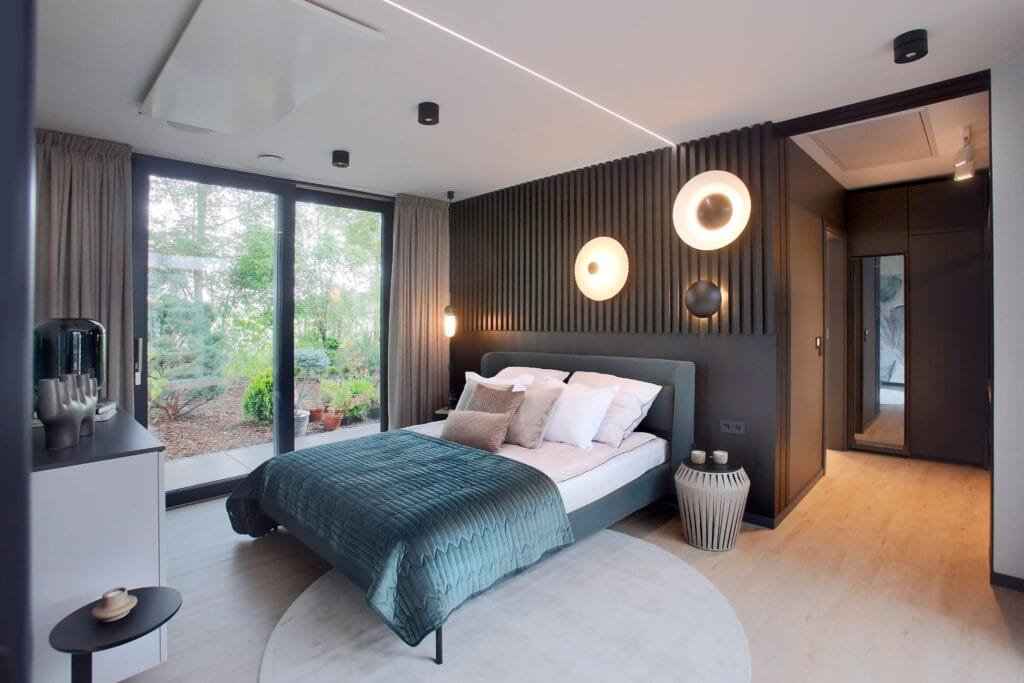 Das Schlafzimmer des Musterhauses Next 115 von Danwood im Bauzentrum München