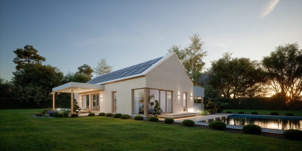 Außenansicht eines 
Kampa Hauses mit Photovoltaik Modulen auf dem Dach.