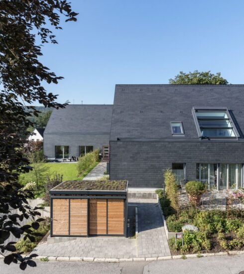 Ansicht eines Rathscheck Hauses mit Schieferverkleidung von außen.