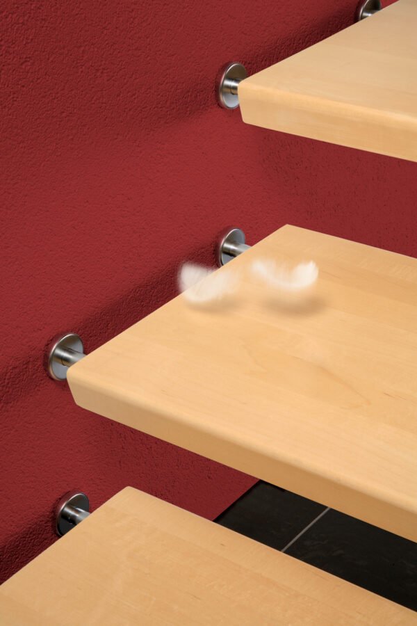 Verankerung der Konstruktion im Gebäude und der Lagerung der einzelnen Trittstufen.