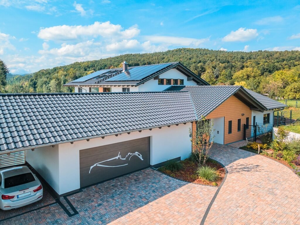 Weberhaus individuelles Architektenhaus Hauseingang mit Garage