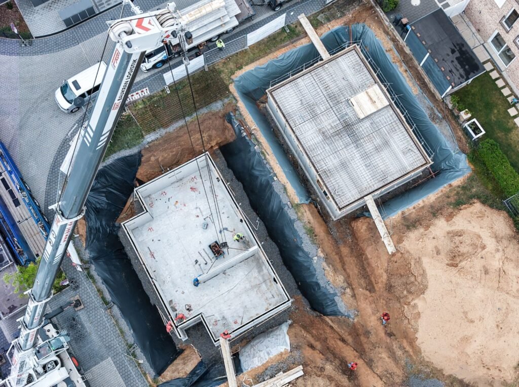 90.000 BV Kellerbau Baustelle mit Kran Glatthaar